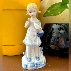 Sweet little porcelain girl figurine with gold accents vintage